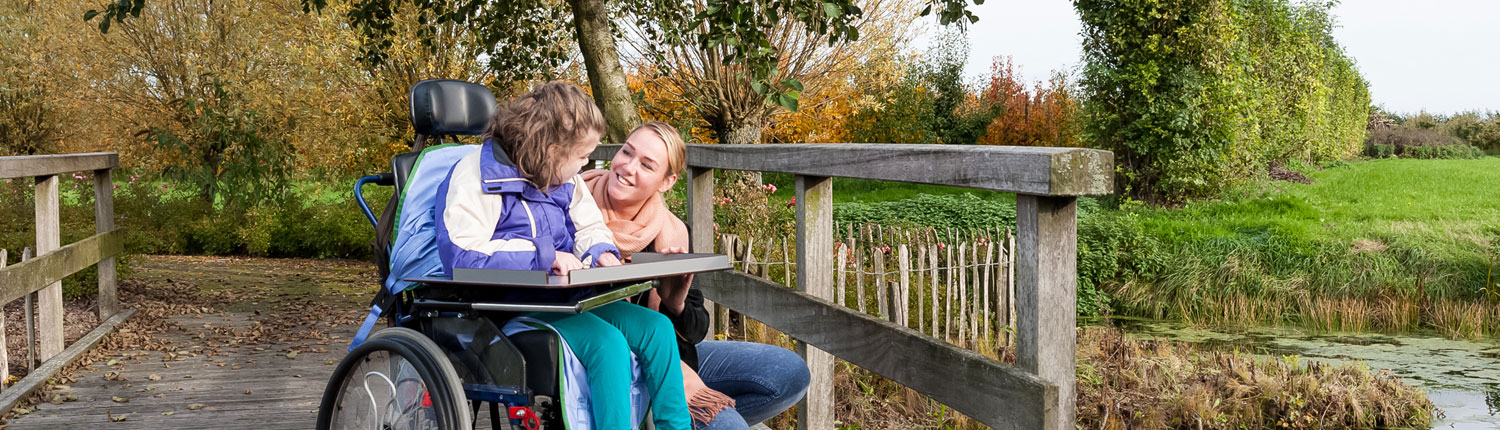 banners-physical-disabilities Recreational therapist helping person with physical disabilities to improve her social and emotional functioning through recreational activities.